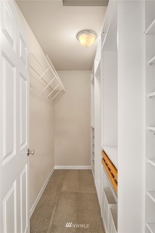a view of a hallway with stairs