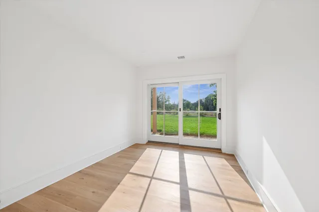 a view of a room with a large window