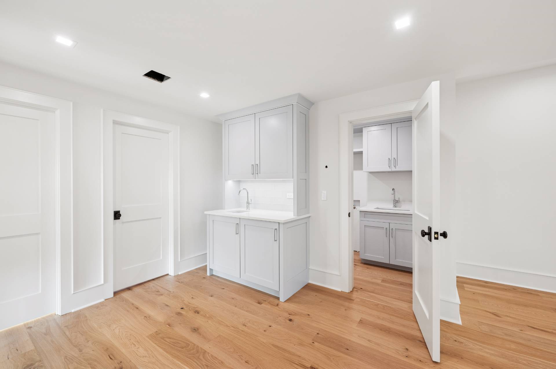 206 Water Hole Road East Hampton, NY 11937 - Photo 24 of 32 a bathroom with a sink and a mirror