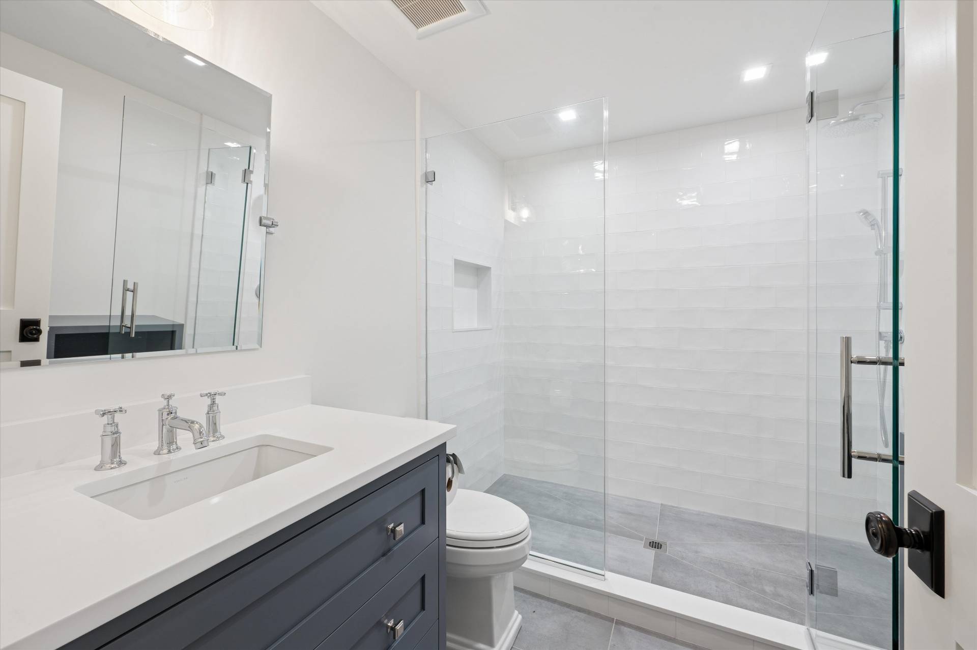 206 Water Hole Road East Hampton, NY 11937 - Photo 27 of 32 a bathroom with a sink a toilet and shower