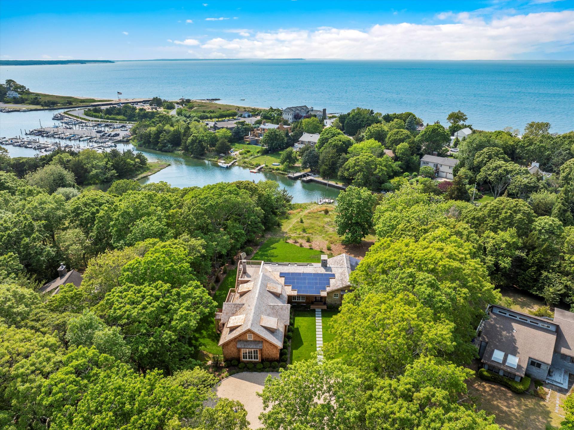 206 Water Hole Road East Hampton, NY 11937 - Photo 30 of 32 an aerial view of a houses with a yard