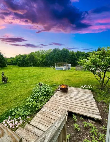 a view of a backyard with a garden