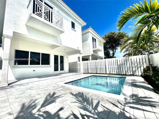 a house view with a garden space