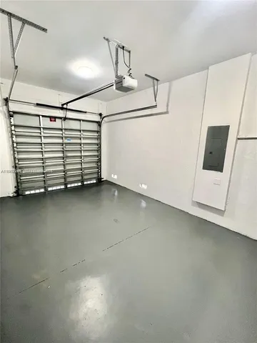 a view of a storage & utility room with stairs