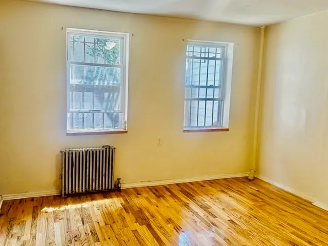 a view of empty room with windows