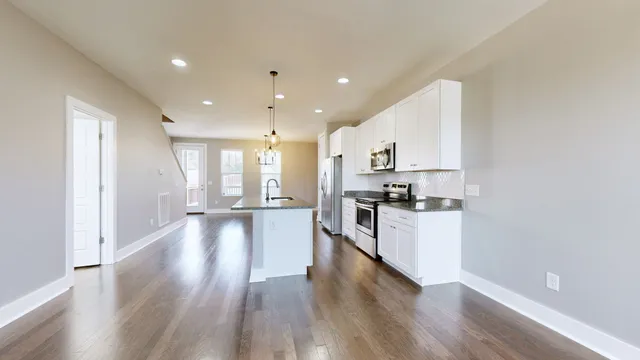 a bedroom with bed and window