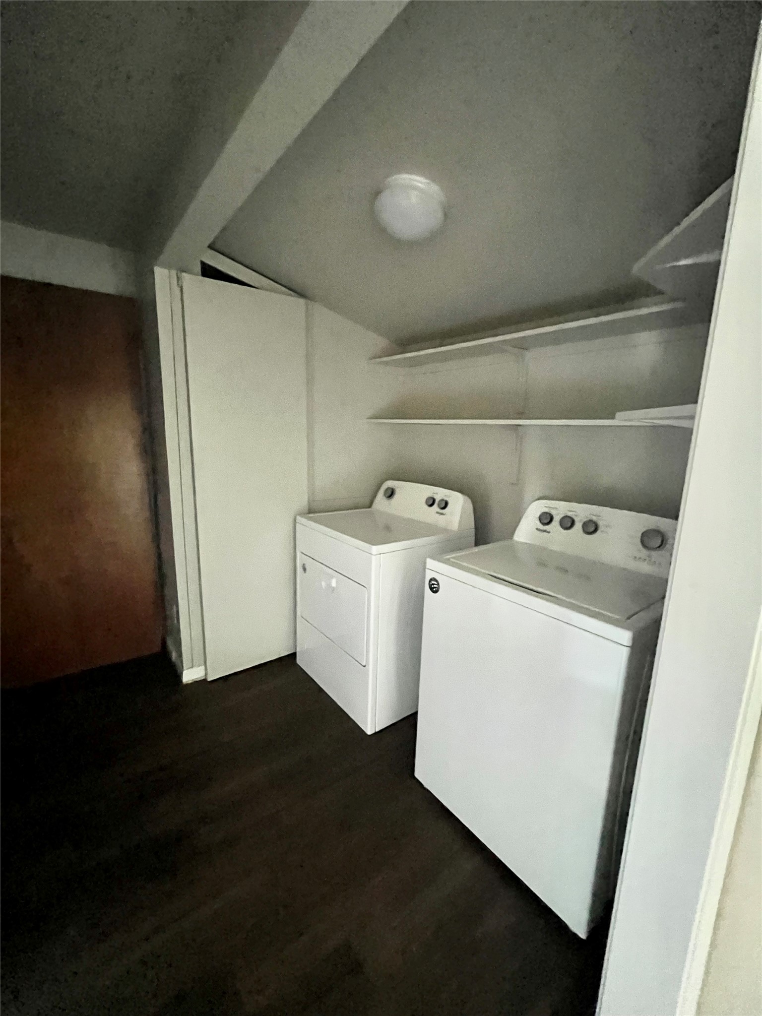 5101 Guadalupe Street, Unit A Austin, TX 78751 - Photo 26 of 28 Laundry room featuring dark wood-type flooring and independent washer and dryer