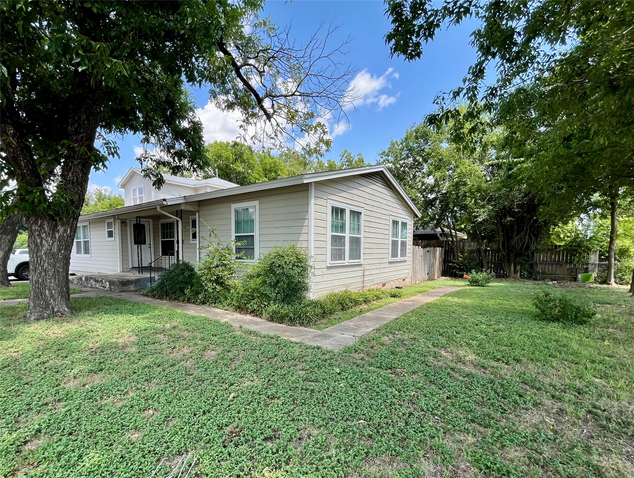 5101 Guadalupe Street, Unit A Austin, TX 78751 - Photo 3 of 28 a view of a house with a yard