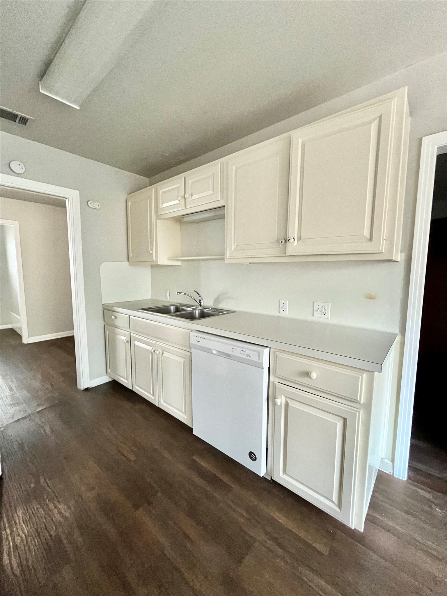 5101 Guadalupe Street, Unit A Austin, TX 78751 - Photo 7 of 28 a kitchen with white cabinets and sink
