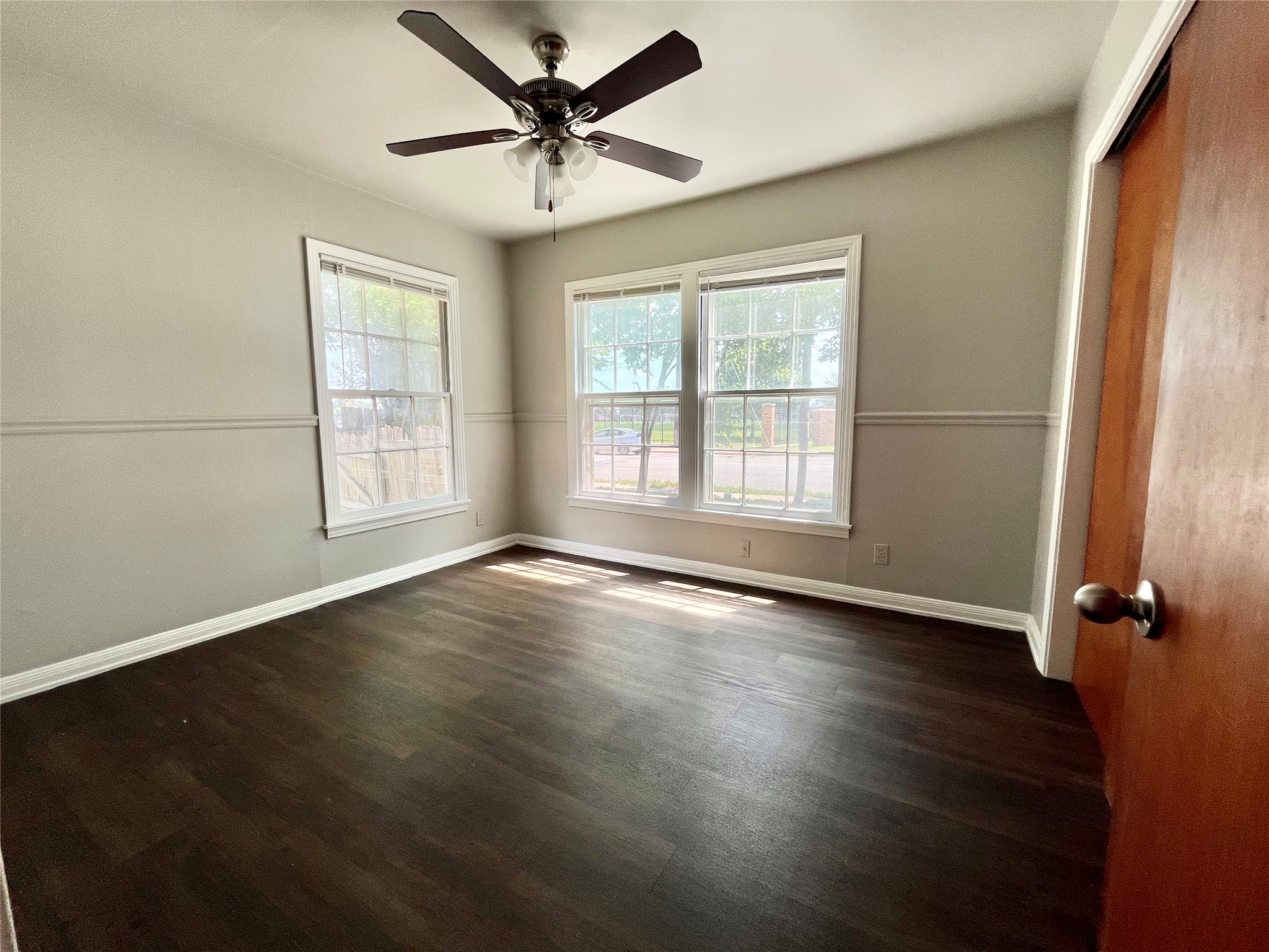 5101 Guadalupe Street, Unit A Austin, TX 78751 - Photo 10 of 28 wooden floor in an empty room with a window