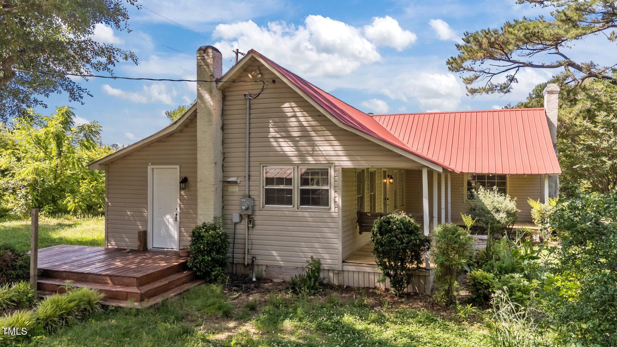1908 Rocky Cross Road Zebulon, NC 27597 - Photo 1 of 47 1-web-or-mls-DJI_20250523160213_0004_D