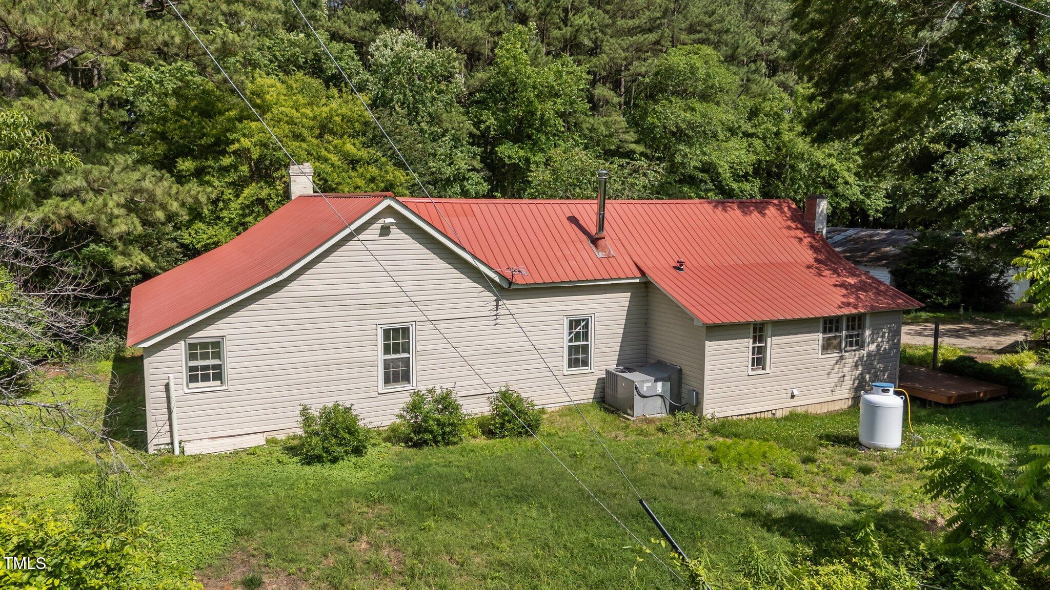 1908 Rocky Cross Road Zebulon, NC 27597 - Photo 12 of 47 12-web-or-mls-DJI_20250523155846_0996_D