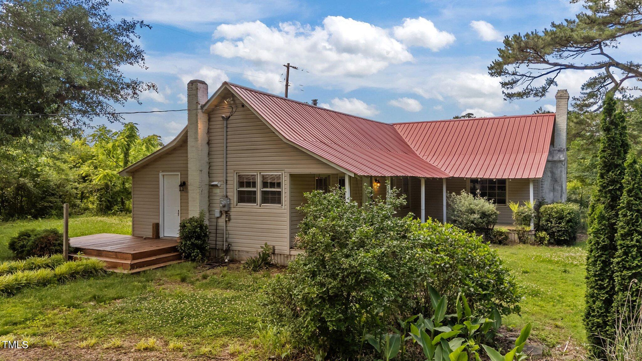 1908 Rocky Cross Road Zebulon, NC 27597 - Photo 2 of 47 2-web-or-mls-DJI_20250523155646_0993_D