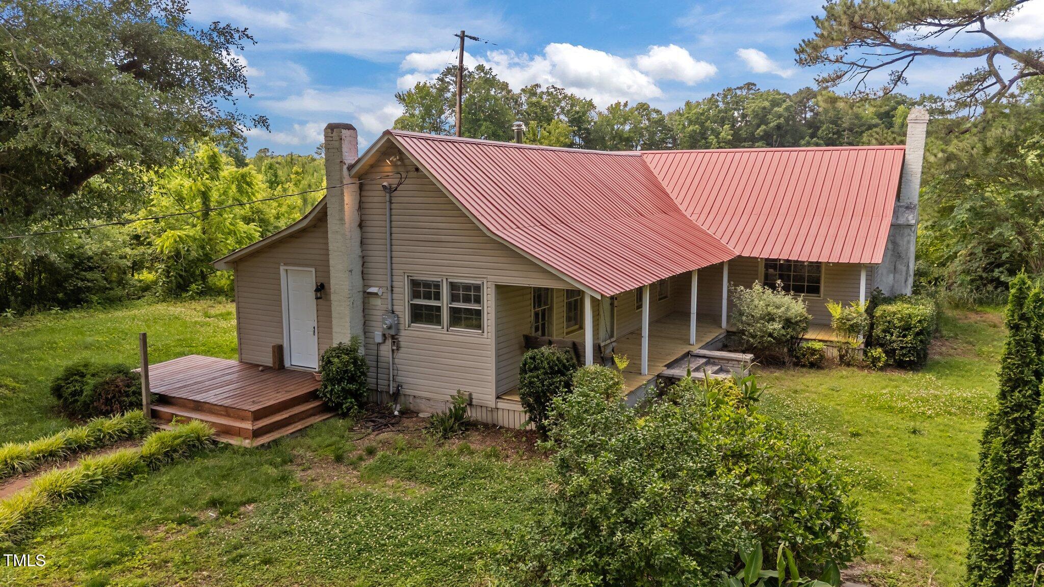 1908 Rocky Cross Road Zebulon, NC 27597 - Photo 3 of 47 3-web-or-mls-DJI_20250523155704_0994_D
