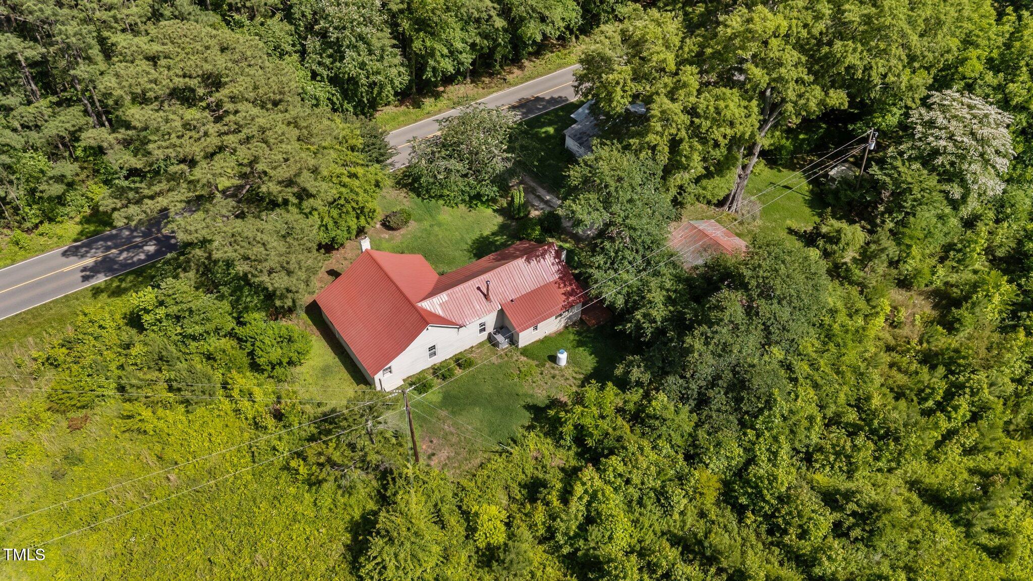 1908 Rocky Cross Road Zebulon, NC 27597 - Photo 6 of 47 6-web-or-mls-DJI_20250523155231_0988_D