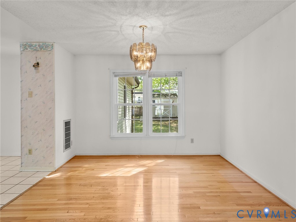 10713 Hamlin Way Chester, VA 23831 - Photo 12 of 49 Open and connected, the dining area flows seamless