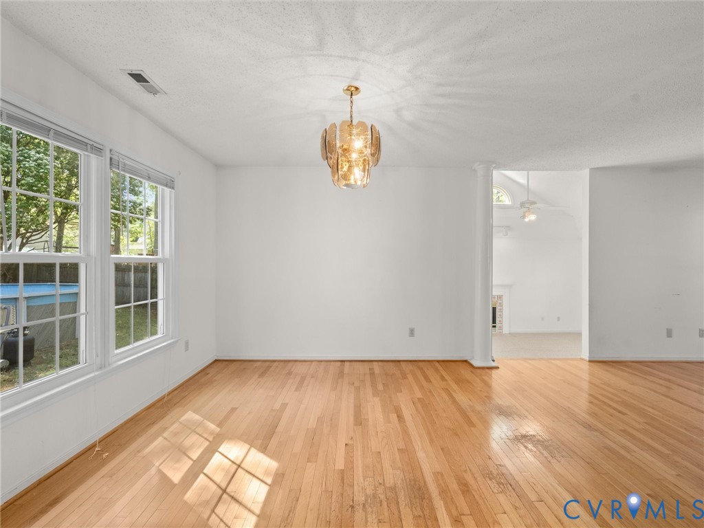 10713 Hamlin Way Chester, VA 23831 - Photo 13 of 49 Bright and inviting, the dining area offers a welc