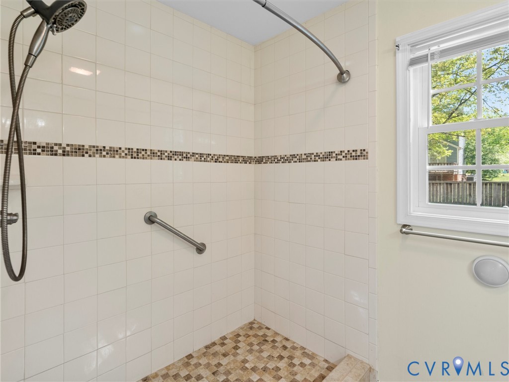 10713 Hamlin Way Chester, VA 23831 - Photo 25 of 49 Updated walk-in shower with tile surround and deco