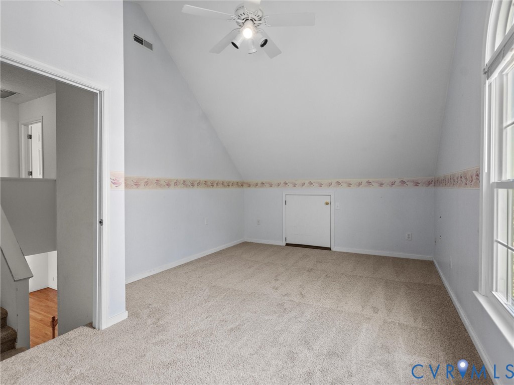 10713 Hamlin Way Chester, VA 23831 - Photo 28 of 49 Light-filled mid-level bedroom with vaulted ceilin