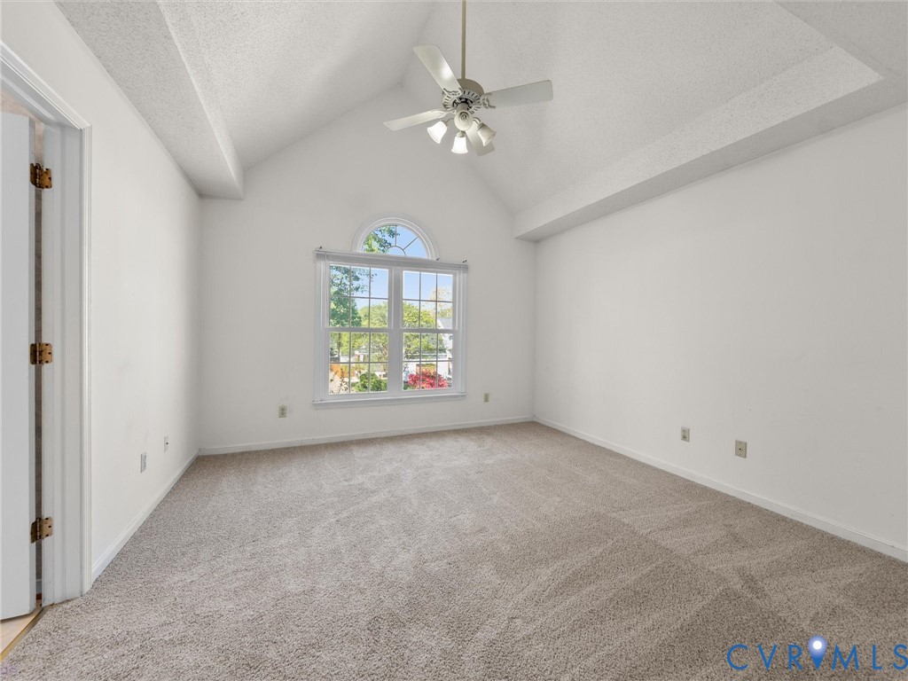 10713 Hamlin Way Chester, VA 23831 - Photo 29 of 49 Spacious second-level primary bedroom with vaulted