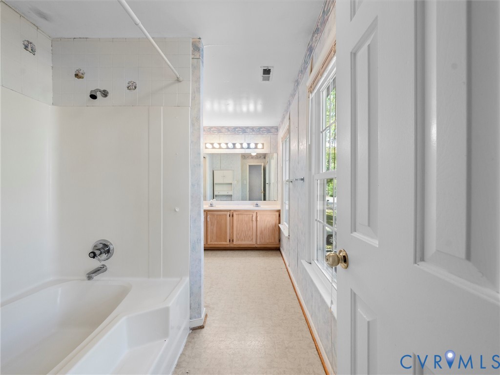 10713 Hamlin Way Chester, VA 23831 - Photo 32 of 49 Spacious primary en-suite bath with extended vanit