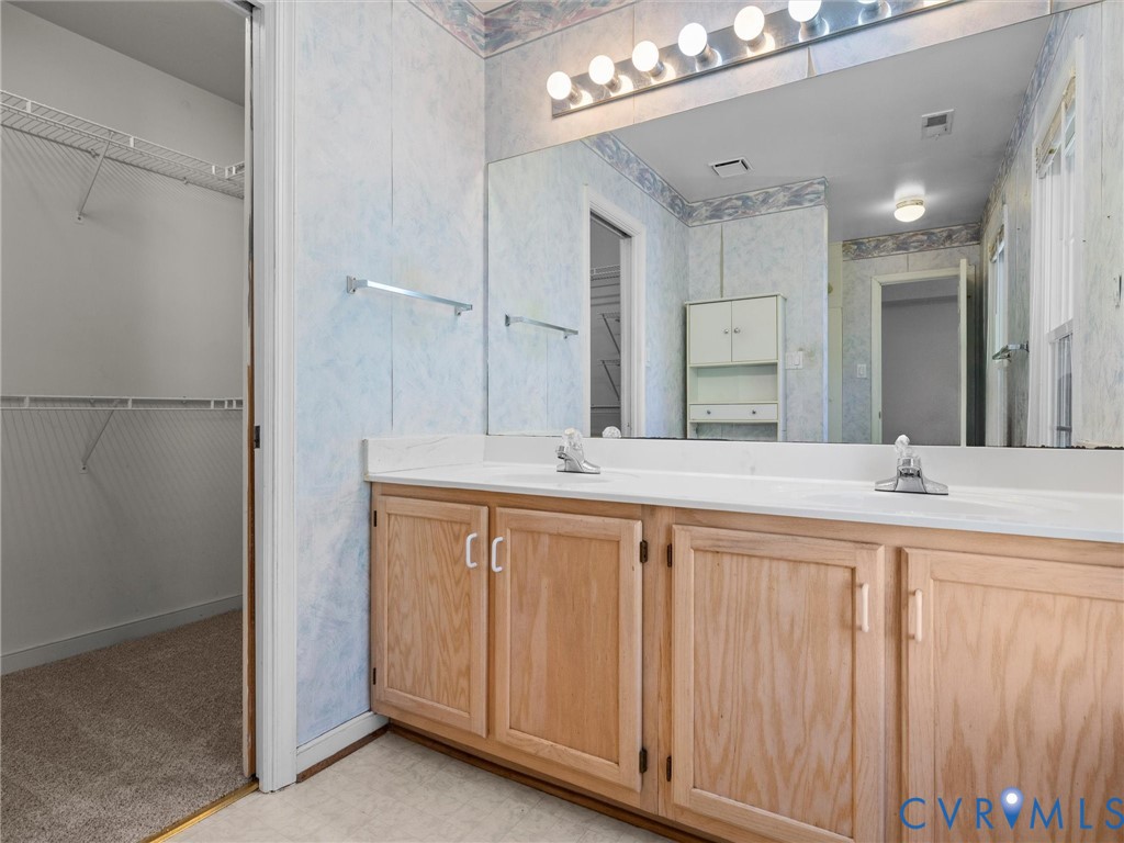 10713 Hamlin Way Chester, VA 23831 - Photo 33 of 49 Spacious double vanity with abundant storage and e