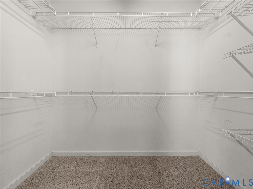10713 Hamlin Way Chester, VA 23831 - Photo 34 of 49 Generous walk-in closet with extensive shelving an