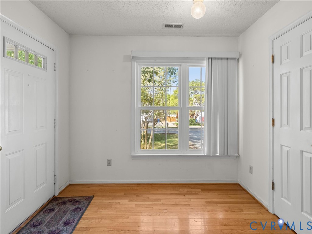 10713 Hamlin Way Chester, VA 23831 - Photo 5 of 49 Step inside to a bright and welcoming entry that s