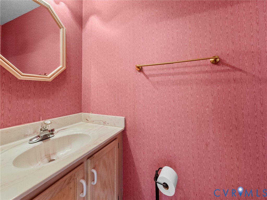 10713 Hamlin Way Chester, VA 23831 - Photo 7 of 49 Conveniently located on the first level, this half