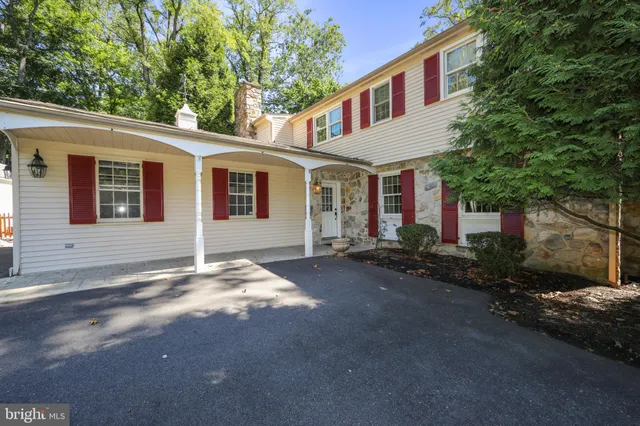 a view of a house with a street