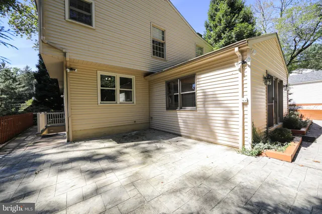 a view of a park with large trees