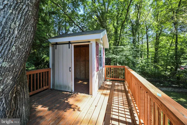 a green field in front of the house