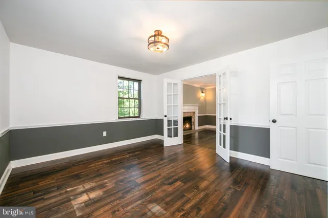 a view of a livingroom with wooden floor