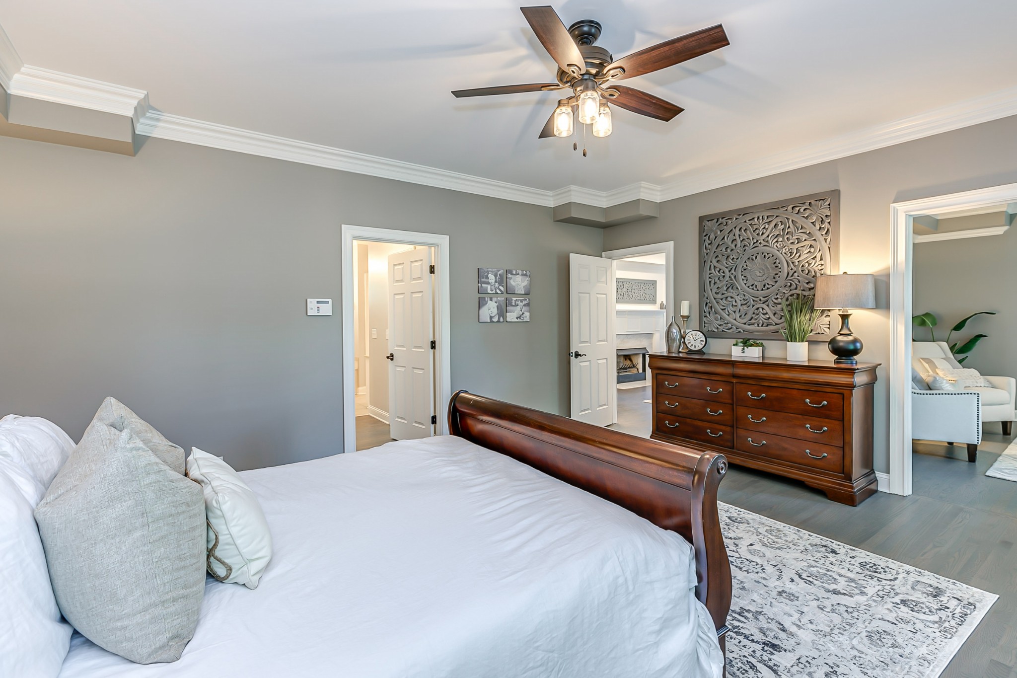8204 Alamo Road Brentwood, TN 37027 - Photo 15 of 41 a bedroom with a bed and a dresser