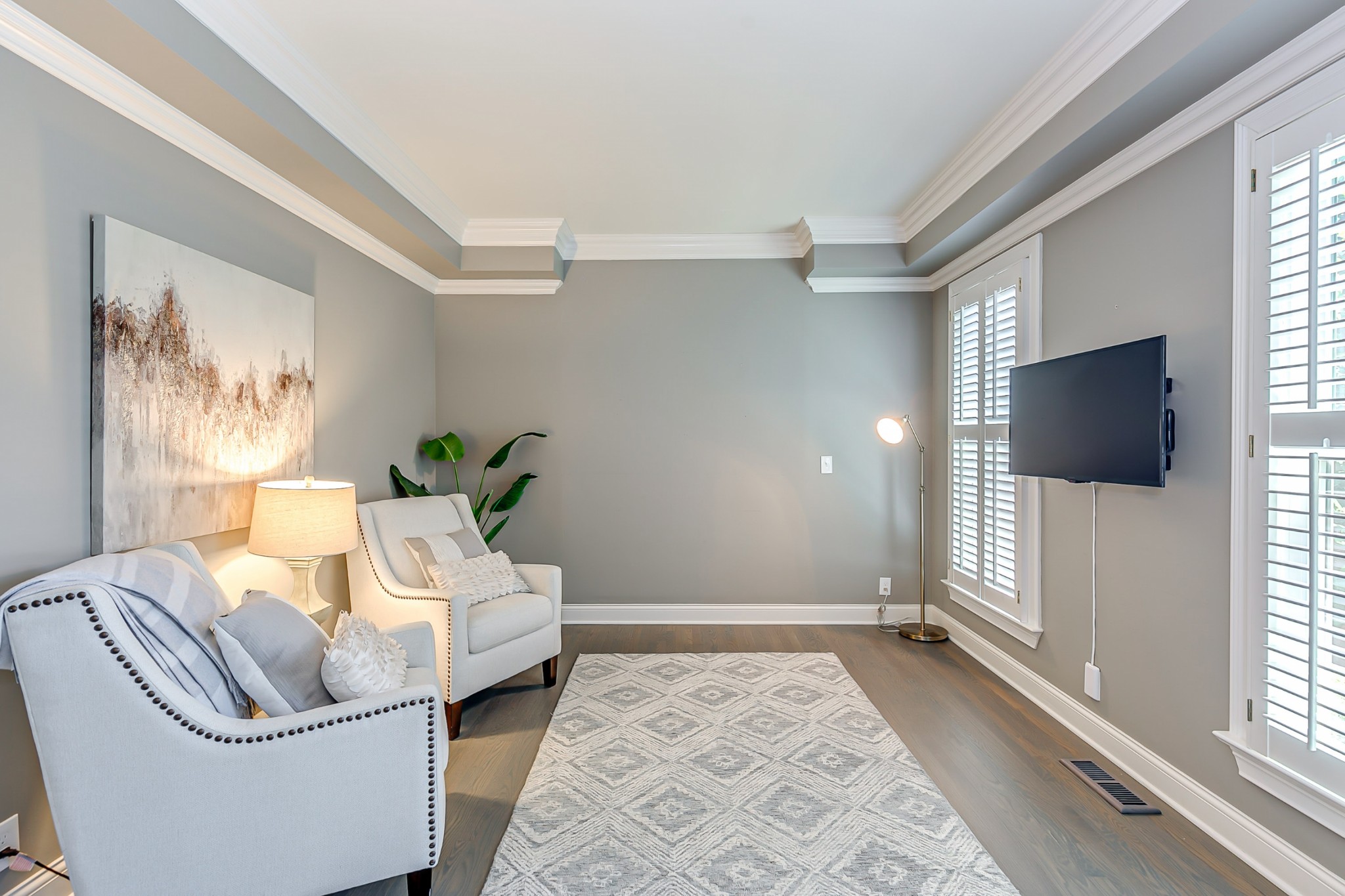 8204 Alamo Road Brentwood, TN 37027 - Photo 16 of 41 a living room with furniture and a flat screen tv