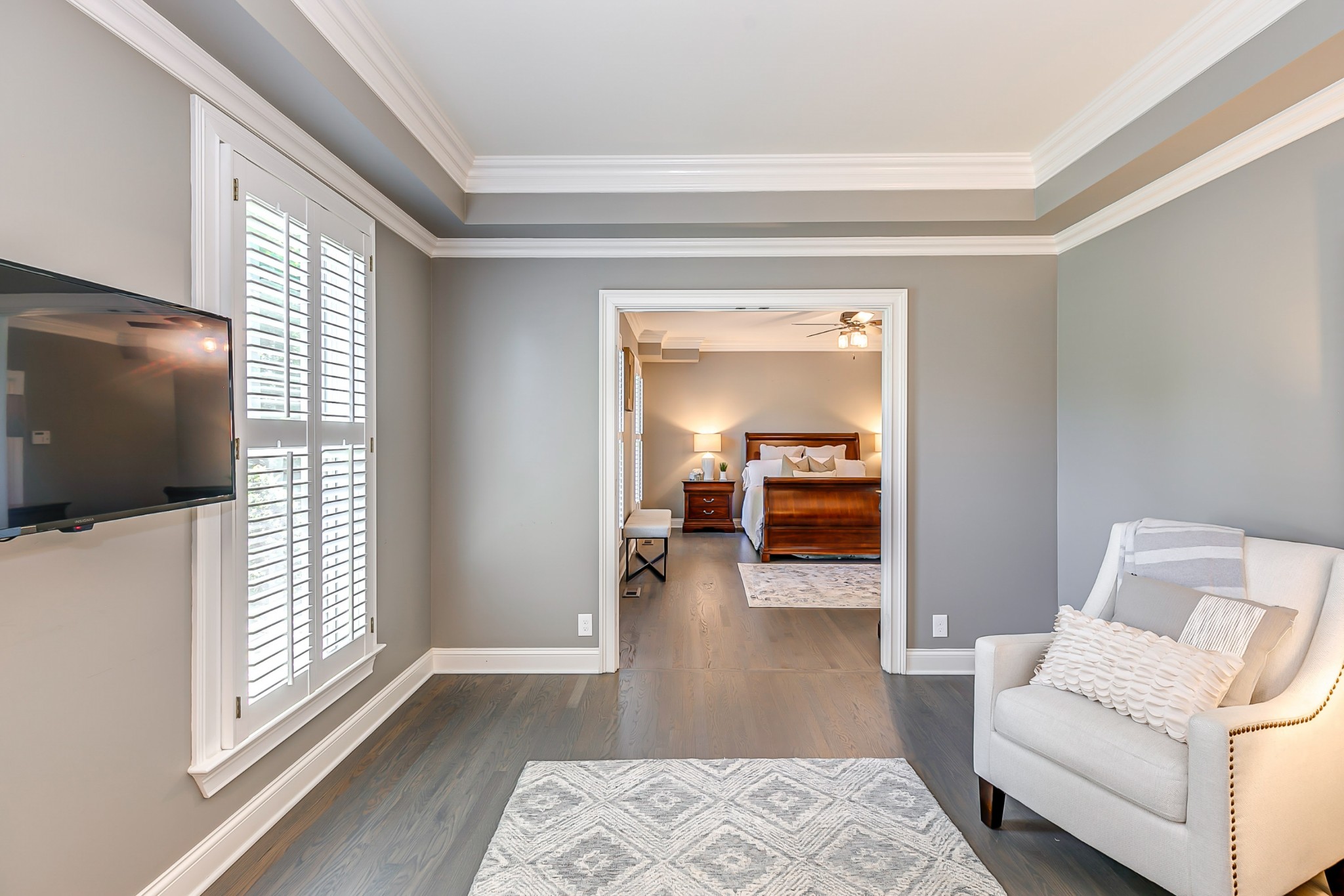 8204 Alamo Road Brentwood, TN 37027 - Photo 18 of 41 a living room with furniture and a flat screen tv
