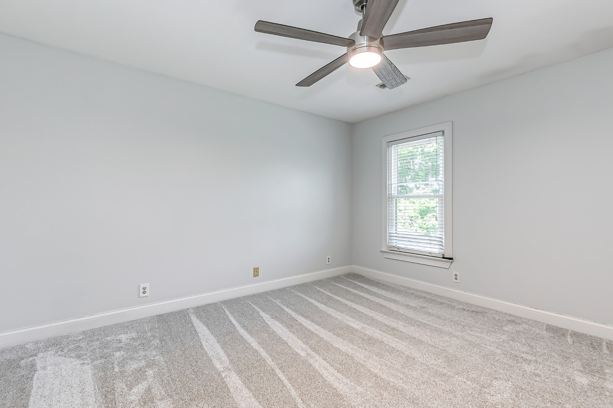 8204 Alamo Road Brentwood, TN 37027 - Photo 29 of 41 an empty room with a window and a fan