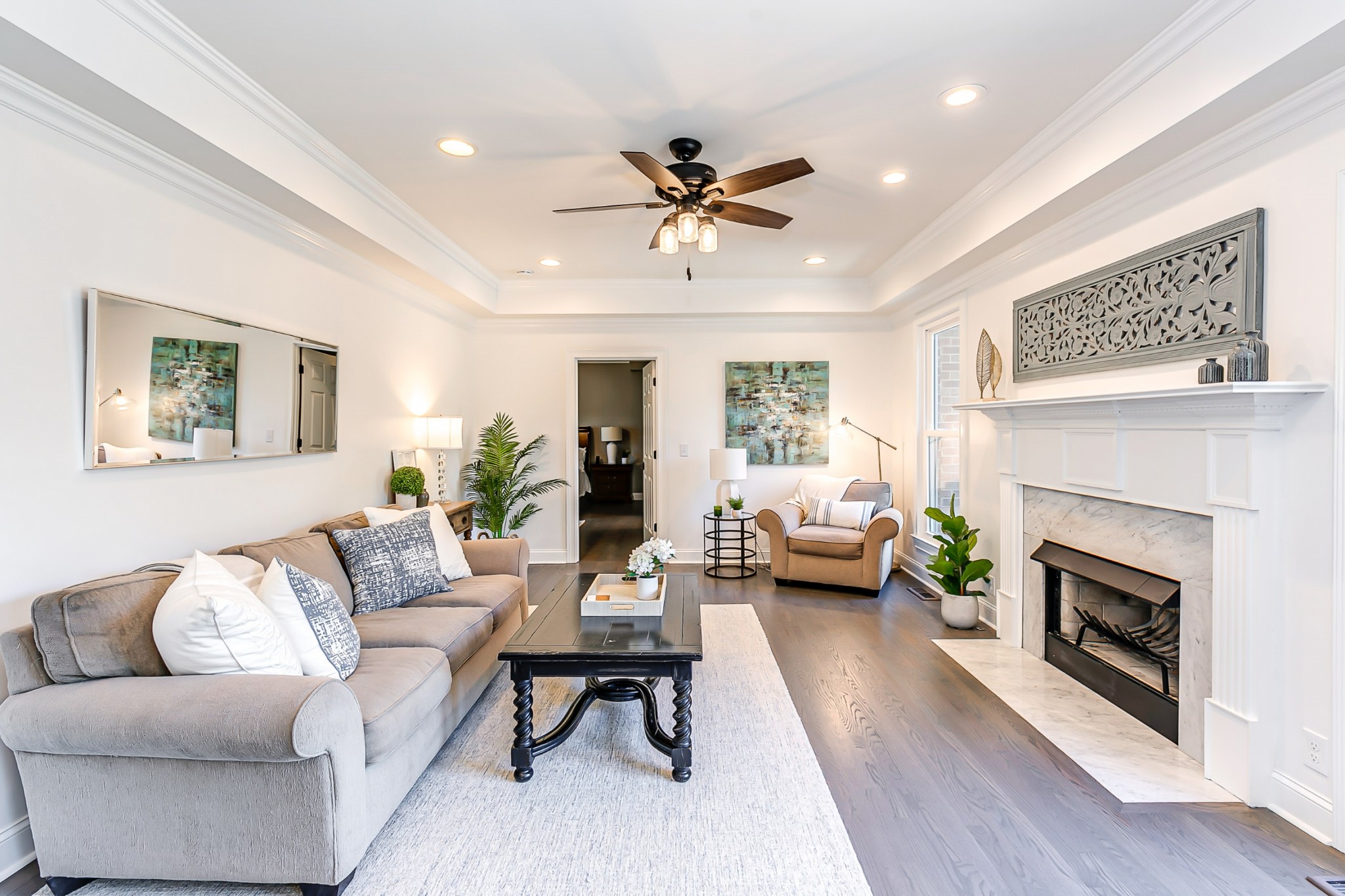 8204 Alamo Road Brentwood, TN 37027 - Photo 6 of 41 a living room with furniture a fireplace and a table
