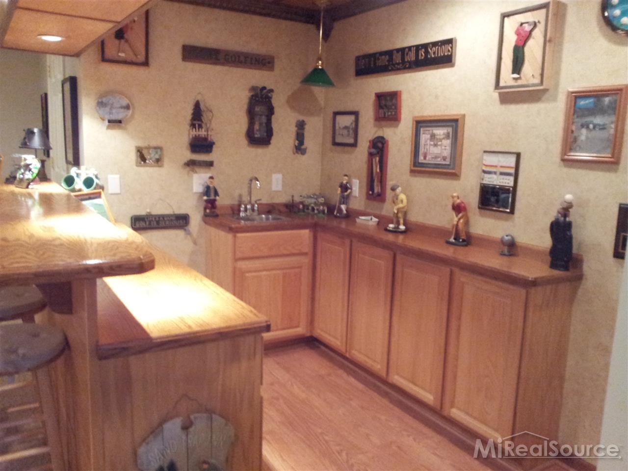 12576 Burt Road Emmett, MI 48022 - Photo 28 of 31 basement bar