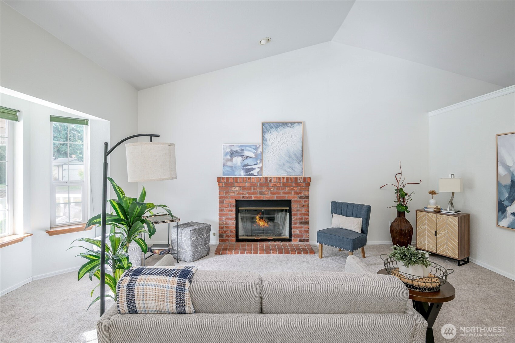 8903 216th St Court East Graham, WA 98338 - Photo 5 of 31 a living room with furniture and a fireplace
