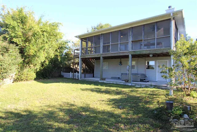 a view of a house with swimming pool