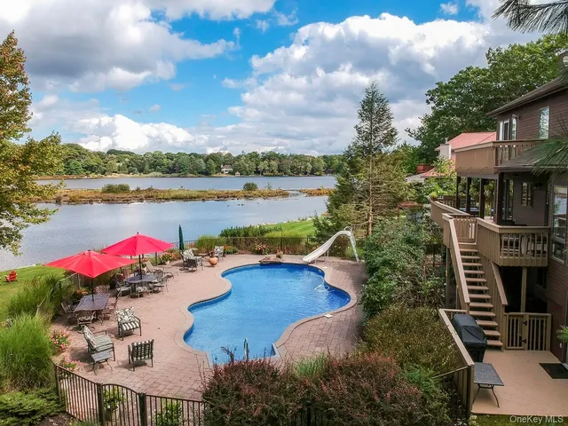 a view of a lake with a patio