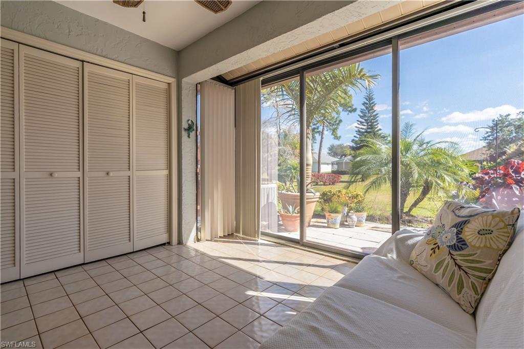 2048 Pine Isle Lane, Unit 2048 Naples, FL 34112 - Photo 23 of 50 a view of a livingroom with a large window