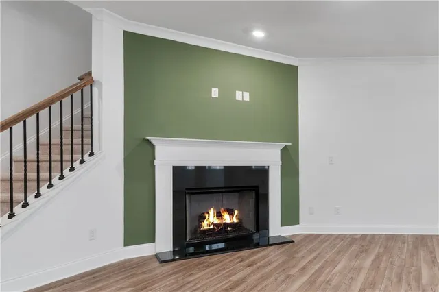 a kitchen with a sink stove and refrigerator