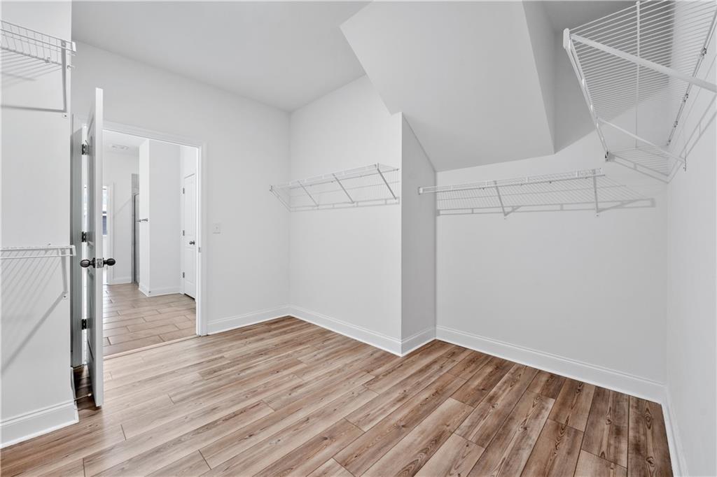 1204 Tahoe Place Canton, GA 30114 - Photo 34 of 73 a view of empty room with wooden floor