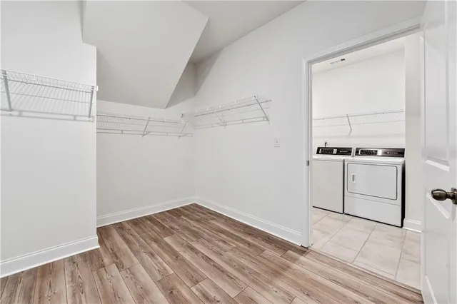 a aerial view of a house with a yard