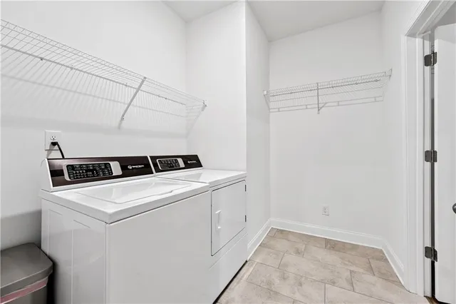 an aerial view of a house with entertaining space