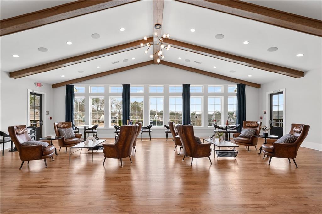 1204 Tahoe Place Canton, GA 30114 - Photo 59 of 73 a living room with furniture and a large window