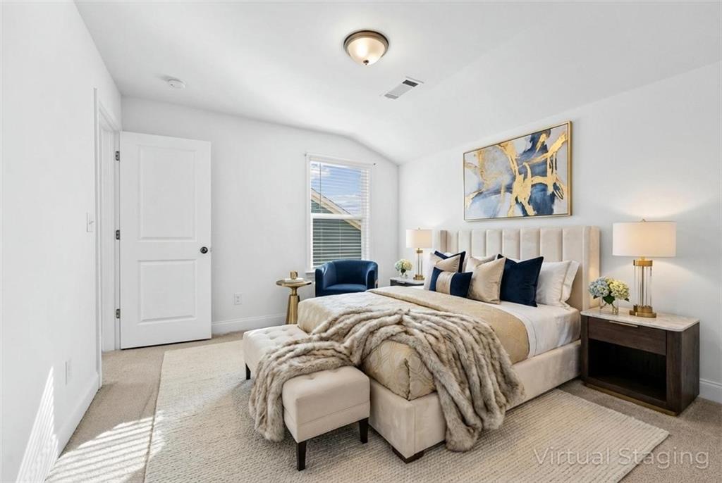 1204 Tahoe Place Canton, GA 30114 - Photo 9 of 73 a bedroom with a bed and a lamp