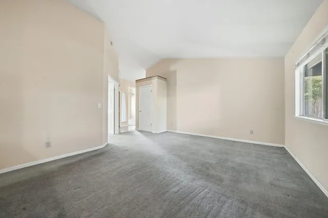 a view of a kitchen with refrigerator